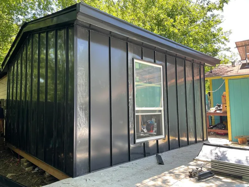 Black standing seam metal wall panels for Metal Roof Installation in Maplewood